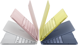 MacBook Neo laptops in silver, blush, citrus, and indigo colors, slightly open and arranged in an arch formation